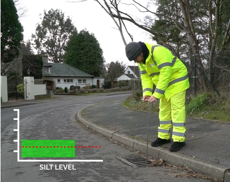 person surveying a gully