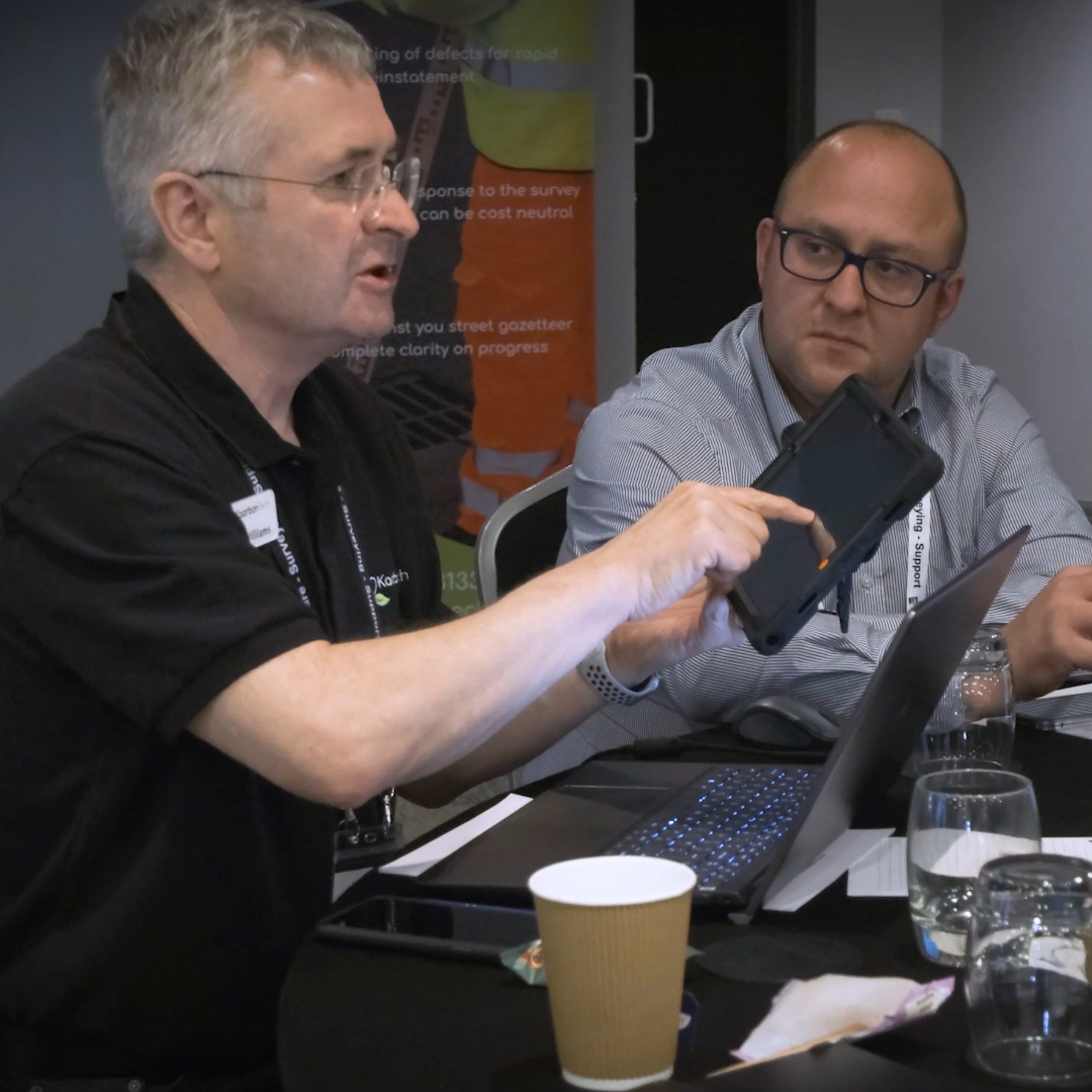 man talking with an iPad